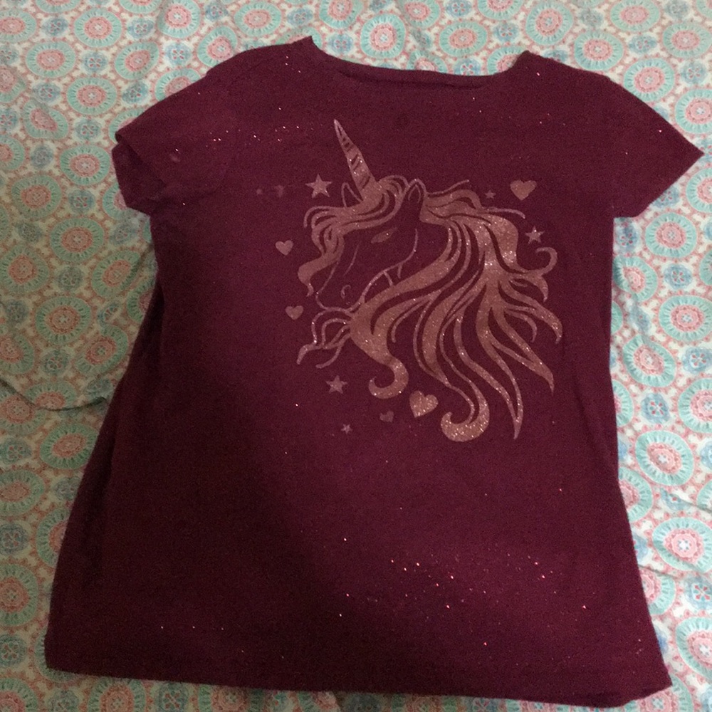 It’s a unicorn glitter shirt